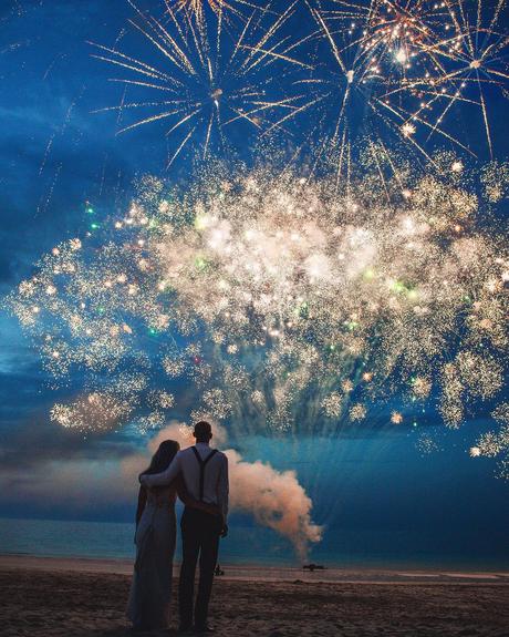 what to do after getting engaged couple at the beach watching fireworks