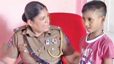 The boy and the infant at the police station.
