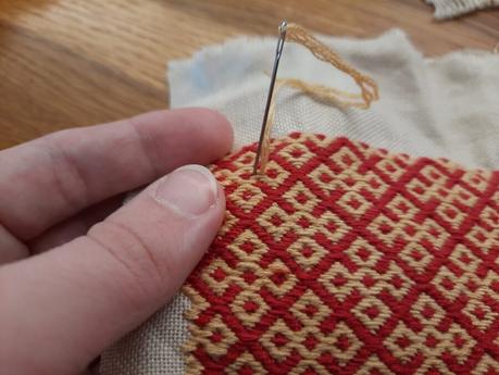 Making a German brick stitch embroidered purse: the last embroidery stitch!