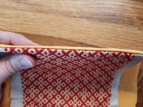 Making a German brick stitch embroidered purse: sewing together the embroidered panels and the lining