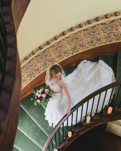 best wedding venues on long island bride walks down the stairs