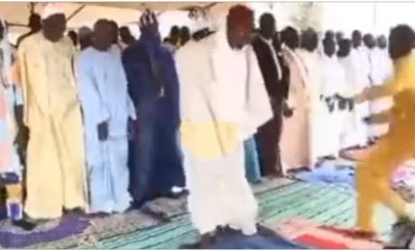 Moment Man Attempts to Stab Imam During Eid Prayer But Knife Fails to Penetrate