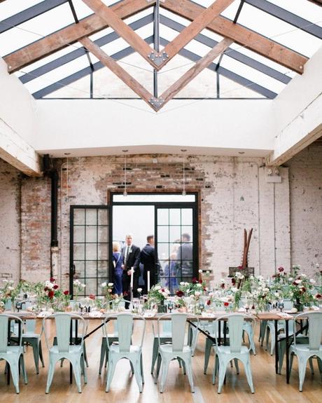 best wedding venues in chicago set tables for guests under a transparent roof