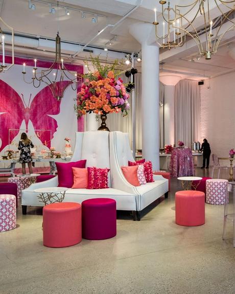 best wedding venues in chicago hall with pink poufs and white sofas