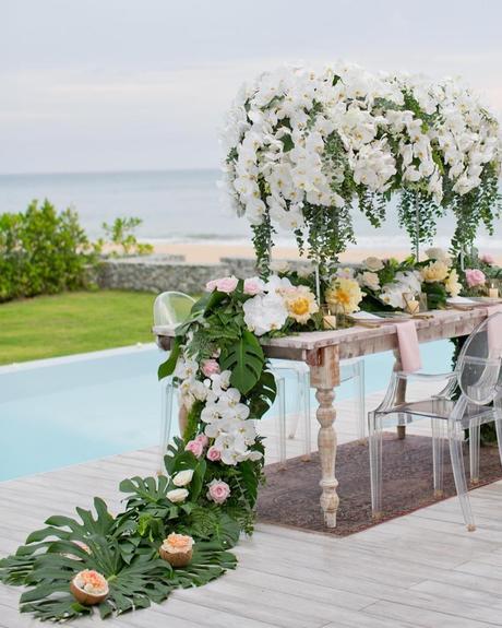 wedding pool party decoration decorated table with flowers bythepool