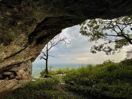 sheltering-from-a-thunderstorm-in-an-ancient-cave-at-yapahuwa-rock-fortress