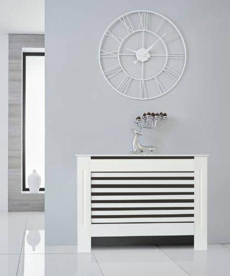 white radiator cover on a gray wall