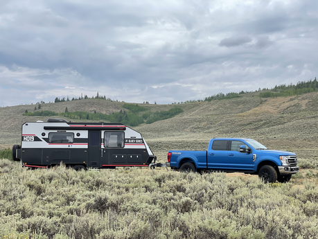 What is the role of vehicle capacity in towing a travel trailer?