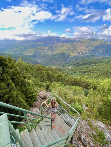 woman-looking-at-view-over-mountains-and-valleys-in-northern-portugal