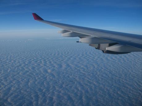 view-above-the-clouds-from-airplane