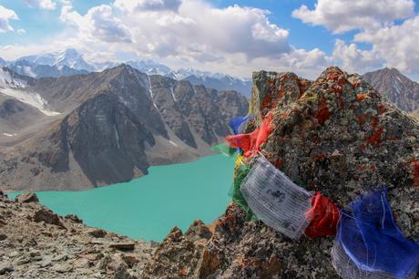 Prayer-flags-above-ala-kul-lake-and-mountains-in-kyrgyzstan