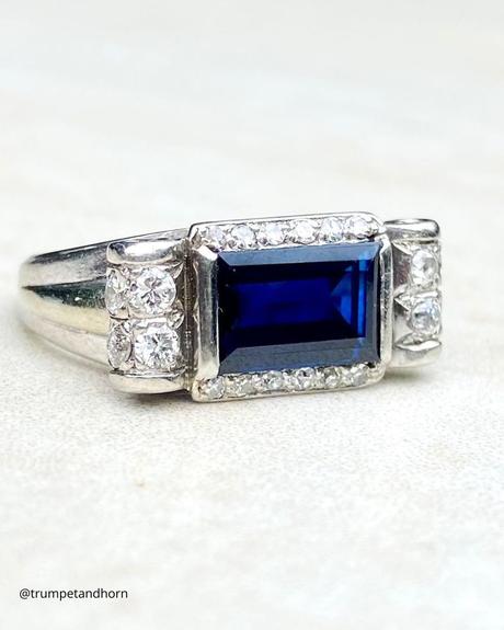 art deco engagement rings ring with a blue stone in a rectangular setting