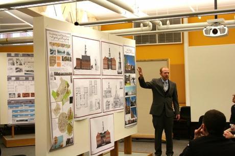 Benjamin Glunz presenting his final project, including architecture and interiors, at Judson University.