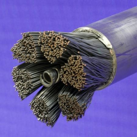Jacketed cable for ITER's toroidal field conductor: superconducting and non-superconducting strands surround a central channel for helium.