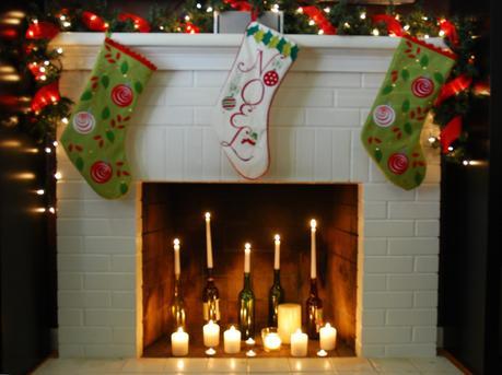 http://www.iidudu.com/images/2013/10/interior-beautiful-charming-fireplace-mantel-decoration-for-christmas-with-nice-colorful-stockings-candle-lights-and-lovely-garland-with-awesome-lighting-cool-ideas-of-how-to-decorate-fireplace-in-m.JPG