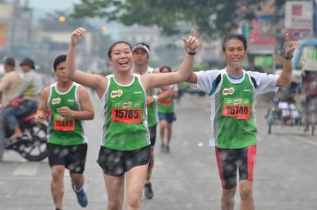 3 - Marathoners cross the finish line of the 37th National MILO Marathon 10-K distance in Cagayan de Oro.