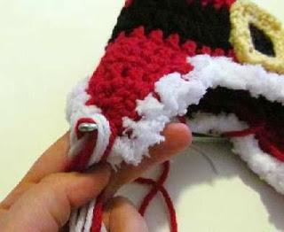 Free Crochet Pattern:  Newborn Santa Earflap Hat