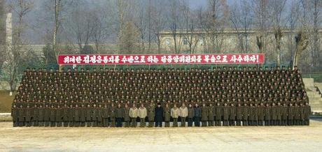 Kim Jong Un attends a commemorative photo-op with officers and service members of the command element of KPA Unit #526 (Photo: Rodong Sinmun).