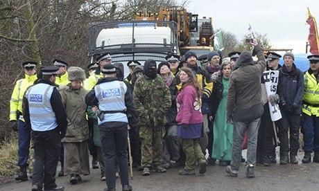 Protesters slow down machinery being transported to fracking site in Barton Moss, Salford. Photograph: Claire Hildreth/ Claire Hildreth/Demotix/Corbis