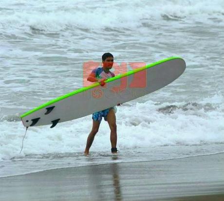 Intrepid Surfing in the Large Waves in Sabang Beach, Baler Aurora.