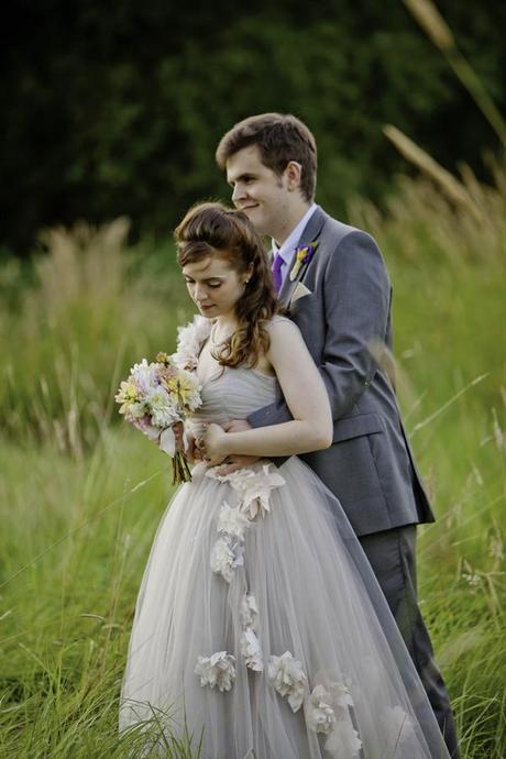 Bride and Groom wearing gray