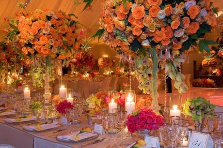 Orange marquee curtains and wedding decorations