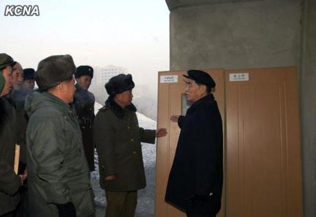 DPRK Premier Pak Pong Ju (R) tours the construction of an apartment complex in the Ryongsong-Sop'o section of Pyongyang (Photo: Rodong Sinmun).