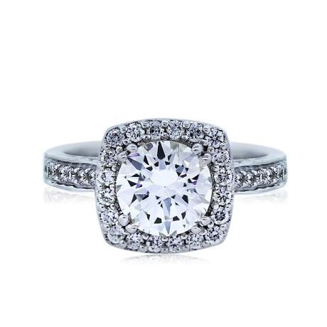 Round Brilliant Halo Style Engagement Ring Set in a Cushion Shaped Halo