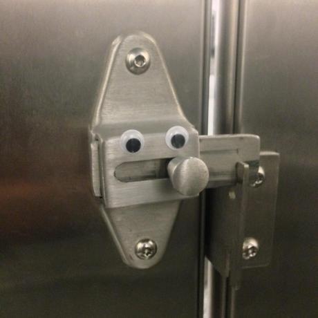 Bathroom lock, or cigar-smoking robot? 
Logan Airport, Boston, MA.  