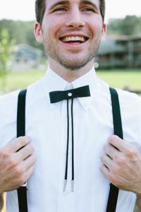 A bolo tie mixed with a bow tie. 