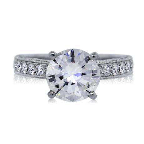 Propose with this classic round brilliant solitaire engagement ring in Central Park!