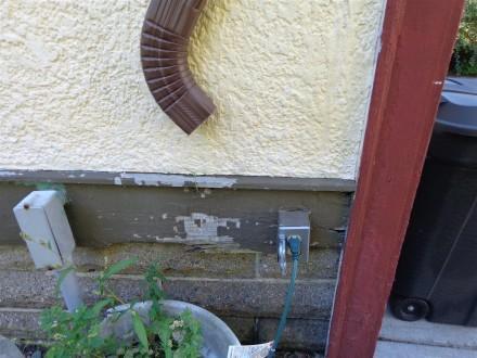 Downspout aimed at outlet