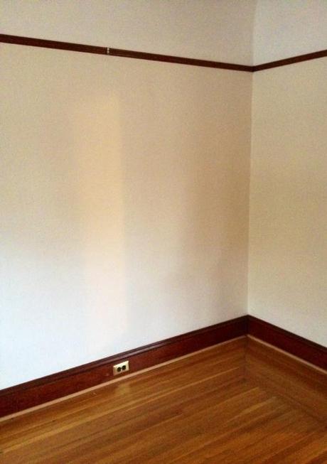 Empty corner in living room waiting for something, but what?