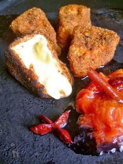 deep- fried breaded camembert with spicy plum sauce