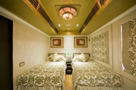 Two beds inside a luxurious train