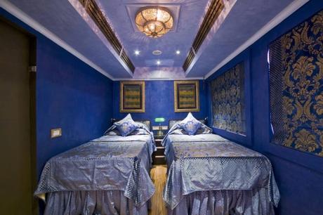 Blue coach with luxurious bed in a luxurious train