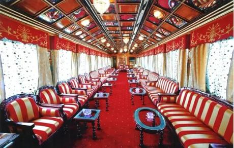 Red furniture inside a luxurious train