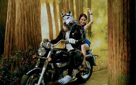 girl and ghost on bike