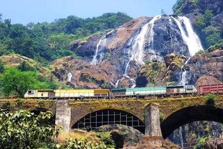 Train passing near Dudhsagar waterfall in Goa