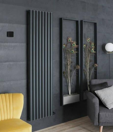 milano aruba ardus dry heat electric radiator in a gray living room