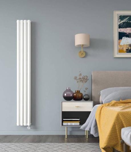 milano aruba vertical electric radiator in a bedroom
