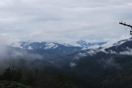 19 Most Beautiful Places To Visit In Uttarakhand In Winter 2022 Mist takes cover over the hills of Binsar