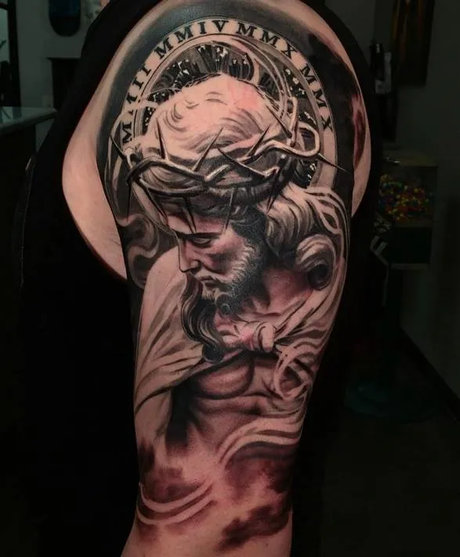 Full-sleeve Jesus tattoo with Crown of thorns