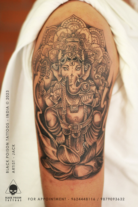 Full-sleeve tattoo of Lord Ganesha