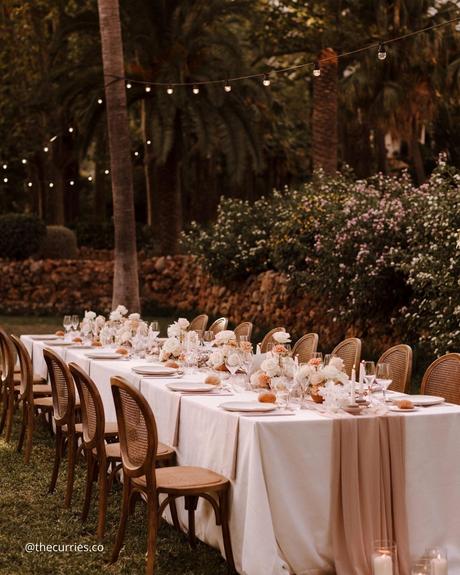 wedding receptions table set in the garden