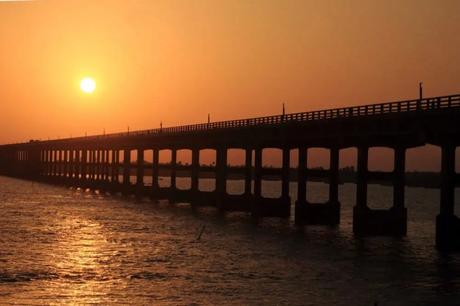 35 Appealing Destinations To Explore In India In March 2023 a bridge on water during sunset