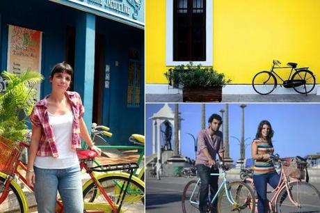 Tourists traveling through the city on bicycles while on a bicycle tour