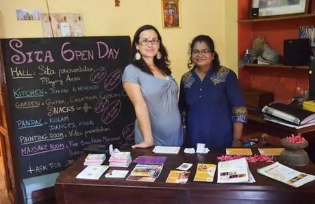 The reception of the Sita Cultural Centre with the board displaying venues for various activities