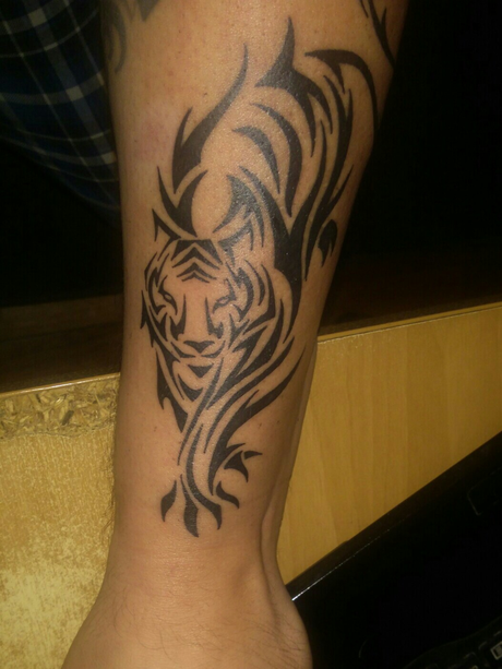 Minimalist tribal tiger tattoo design