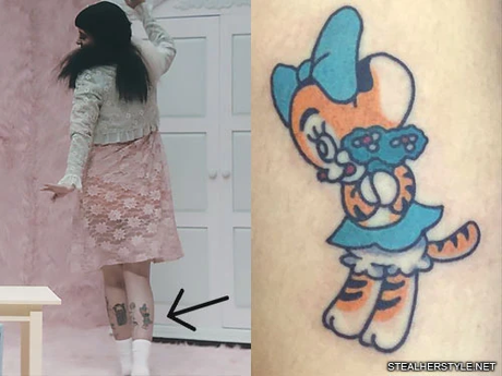 Melanie Martinez Leg tattoo of Tillie Tiger